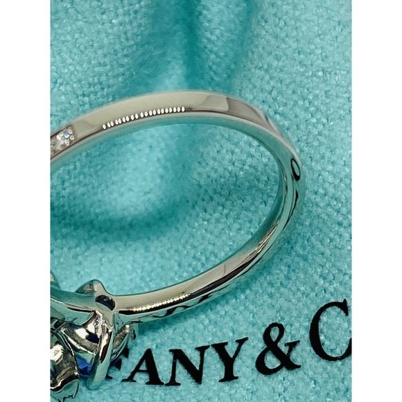 TIFFANY & CO. Platinum Pt950 Diamond & Tanzanite Paper  Tiffany Paper Flowers Platinum diamonds and tanzanite flower ring, Size 6
